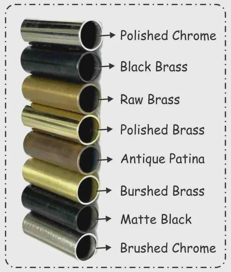May include: A collection of cylindrical metal tubes in various finishes, including polished chrome, black brass, raw brass, polished brass, antique patina, brushed brass, matte black, and brushed chrome. Each tube is labeled with its finish.