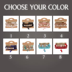 May include: The image displays eight sets of beaded bracelets in various colors, each on a cardboard backing. The text "CHOOSE YOUR COLOR" is at the top. The bracelets include white, black, pink, brown, blue, turquoise, and red.