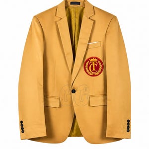 May include: Mustard yellow blazer with a classic notched lapel and a two-button closure. Features a red and gold embroidered crest on the chest. Includes a chest pocket and two front pockets. The sleeves have four buttons. The interior lining is a golden yellow.