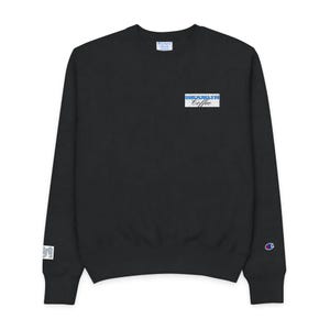 May include: Black crew neck sweatshirt featuring the text "BROOKLYN Coffee" in a white and blue rectangular design on the chest. A small Champion logo is on the left sleeve. The sweatshirt is a solid black colour.