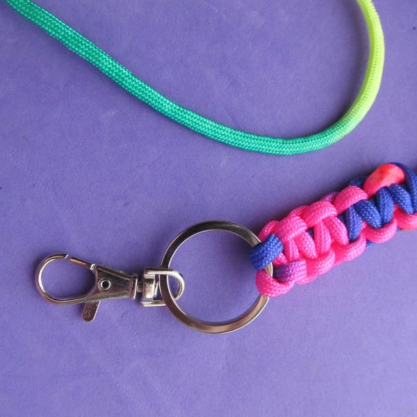 Rainbow Paracord Lanyard.  Multi-color lanyard with key ring, lobster claw hook.  Badge holder, key ring.  Each one has a different look.