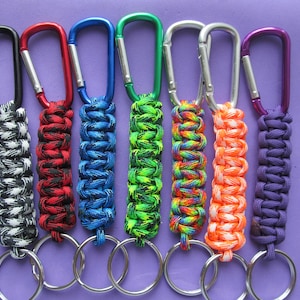Paracord key ring. Paracord key fob for keys, ID badges.  Key ring on one end, carabiner hook on the other.  NEW 2025 colors to choose from!