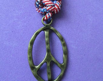 PEACE Sign Keychain. Red, white & blue paracord keychain with 1" key ring and large 1.5" metal peace sign charm.