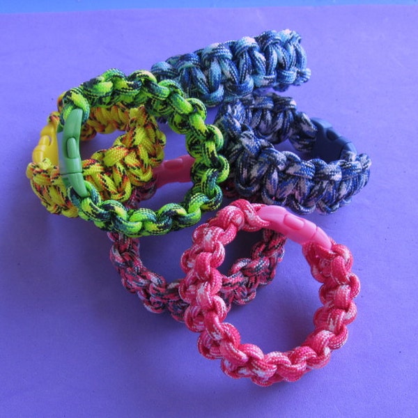 Kids paracord bracelets in unique mixed colors. Many fun NEW COLORS for kids!  For size measure wrist. Order color number from chart.