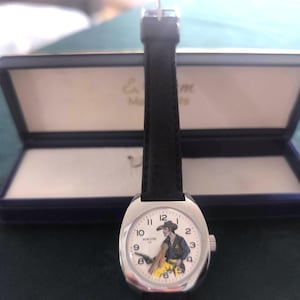 Relógio de cowboy vintage com revólver móvel, relógio mecânico de colecionador, estilo faroeste, mostrador animado, presente retrô raro