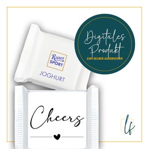 May include: Two white chocolate bars with text. One bar says "Ritter Sport Joghurt" in blue. The other bar says "Cheers" with a black heart. A teal circle says "Digitales Produkt zum selber ausdrucken".