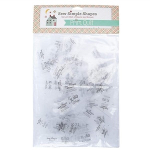 Peut inclure: Un sachet en plastique transparent contenant plusieurs gabarits de matelassage en acrylique blanc étiquetés Sew Simple Shapes by Lori Holt of Bee in my Bonnet Prim Quilt. Chaque gabarit porte un code alphanumérique unique comme K-26, K-31 et K-62.