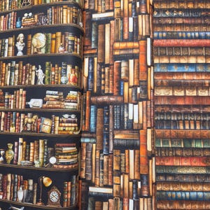 May include: A fabric print featuring a library theme with three distinct sections. The left section shows shelves with books and decorative objects. The middle section displays vertical books. The right section shows horizontal rows of antique book spines.