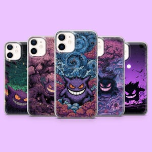 May include: Five clear phone cases with unique designs. Each case features a purple cartoon character with a wide grin. The backgrounds include swirling blue skies, purple trees, and a dark, starry night. The cases are displayed on a light purple surface.
