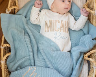Personalized newborn outfit and hat set with custom embroidery. Soft coming home outfit for newborn photos and baby gifts.
