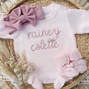 Personalized newborn pink knit ruffle sweater baby outfit, Custom cotton knitted baby bodysuit, Valentines day girl ourfit 5.0 (31.8k) By WonderfullyMade13914 Made by WonderfullyMade13914 Shop owned by Cassie 15 years on Etsy