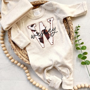 Personalized neutral baby romper and hat set, custom infant boy coming home outfit, baby shower gift, sleeper with footies, cow print