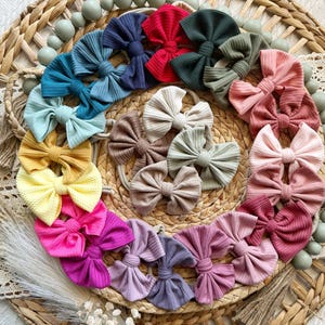 Baby headbands on nylon band, handmade baby bows, multiple colors, basic solid bows