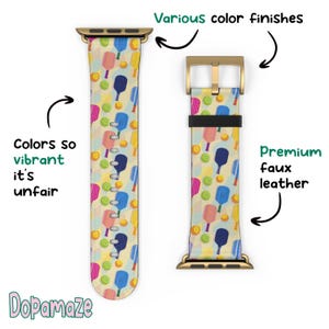 Puede incluir: Correa de reloj con un colorido diseño de palas y pelotas de pickleball. La correa está hecha de cuero sintético de primera calidad y presenta varios acabados de color. También se ve el texto "Colors so vibrant it's unfair".