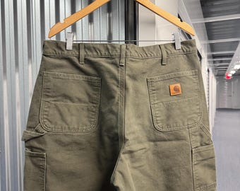 Pantalones de trabajo Carhartt Workwear aislantes de color verde carpintero, estilo vintage de los años 90, talla 38x32.