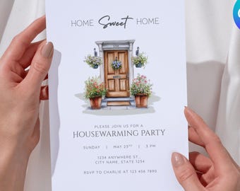May include: A white invitation card held by hands, featuring the text "Home Sweet Home" above an illustration of a door with floral accents. The card is for a housewarming party, with date, time, and address details.