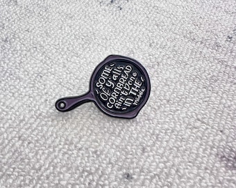 Épingle à poêle unique en fonte avec dicton humoristique en forme de pain de maïs