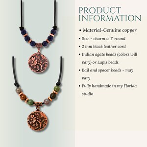 A necklace featuring a black cord strung with multi-colored stone beads, copper-toned spacers, and a central circular copper pendant embossed with a detailed floral design. The pendant displays a raised pattern of flowers and leaves.