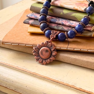 Copper Sunflower Necklace Handmade Artisan Crafted Pendant Genuine Metal Flower Charm Leather Cord Adjustable Length Boho Statement Piece Birthday Gift Teen Women Jewelry Nature Inspired Design Vintage Rustic Style Everyday Wear Bohemian