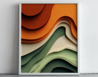 May include: Abstract art print in a white frame. The artwork features layered, textured paper in shades of orange, brown, green, and cream. The design creates a sense of depth and dimension, with curved, wave-like forms.