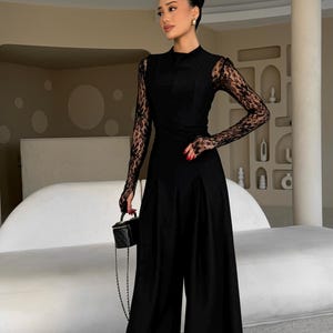 Elegant Black Sleeveless Jumpsuit: Minimalist Party Outfit