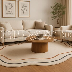 May include: A living room with a cream sofa, armchair, and a round wooden coffee table. A beige rug with wavy edges and brown and navy stripes is on the wooden floor. The text "RUGVERSESTORE" is overlaid on the image.