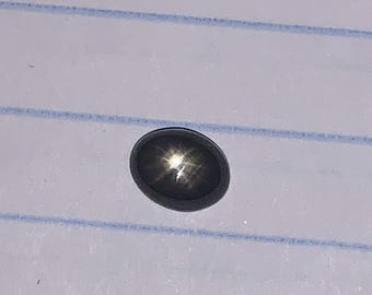 Natural 12 ray black star sapphire Thailand 8.4x6.7 (2.20ct)
