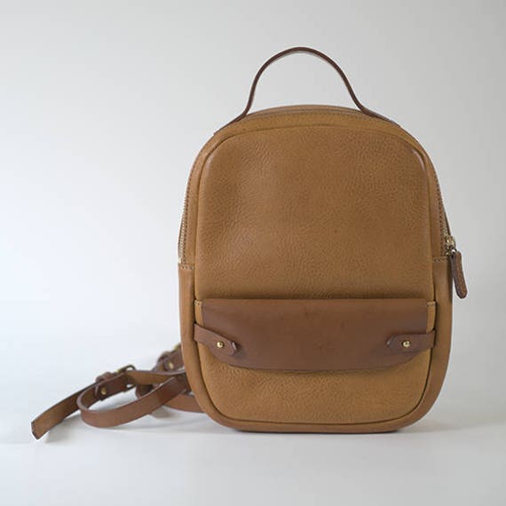 small tan leather backpack