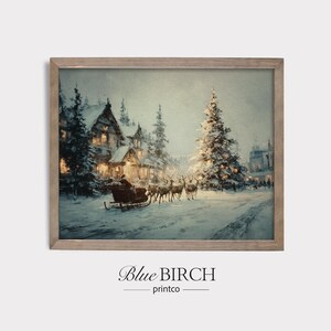 May include: A framed winter scene depicts a snowy village with a horse-drawn sleigh, reindeer, and a decorated Christmas tree. The artwork has a vintage aesthetic, with soft lighting and a muted color palette. The text "Blue Birch printco" is at the bottom.