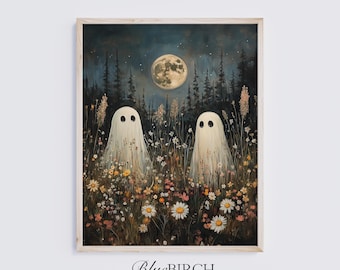 May include: A framed art print featuring two white ghost figures standing in a field of wildflowers under a full moon and dark forest backdrop. The text BlueBIRCH printco is printed in black at the bottom center of the white border area.