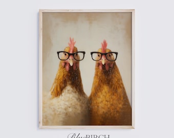 May include: A framed print featuring two chickens wearing black-rimmed glasses. The chickens have brown and white feathers and red combs. The print has a light beige background and the text "BlueBIRCH printco" at the bottom.