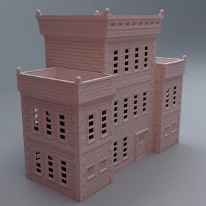 May include: A light pink miniature building with a brick facade. The building has multiple stories, windows, and a flat roof with decorative elements. The architectural model features a central tower and two side structures, all in a uniform color.
