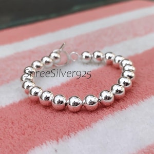 Sterling Silver Ball Spinner Bracelet: Chunky 8mm Bead Bangle