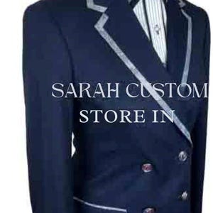 May include: A navy blue double-breasted blazer with silver trim and buttons. The blazer is worn over a white and gray striped shirt and tie. The text "SARAH CUSTOM STORE IN" is visible on the blazer.