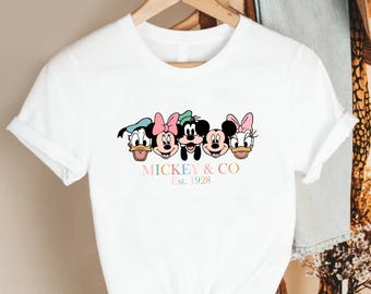 Vintage Friends Crew Shirt with Classic Cartoon Faces, Retro Pastel Character Line Art and Playful Established Design  Fun Nostalgic Outfits