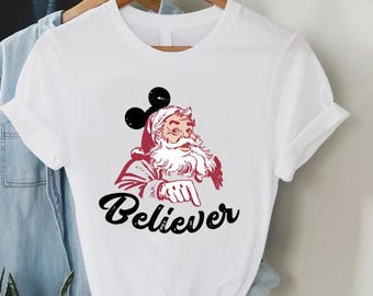 Christmas Believer Shirt, Santa Mickey Tee, Disney Holiday TShirt, Magical Xmas Shirt, Mickey Ears Santa Top, Cute Festive Graphic Tee