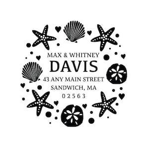 May include: Black and white return address stamp with a seashell, starfish, and sand dollar design. The text reads "Max & Whitney Davis, 43 Any Main Street, Sandwich, MA 02563".