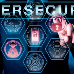 May include: A person's finger touches a glowing padlock icon, part of a cybersecurity graphic. The word "CYBERSECURITY" is at the top. The image features various digital security symbols in a blue and pink color scheme.