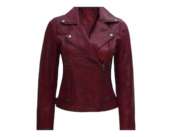 May include: A burgundy leather jacket with a classic asymmetrical zip closure. The jacket features a notched collar, quilted shoulder details, and silver-tone hardware. A stylish outerwear piece.