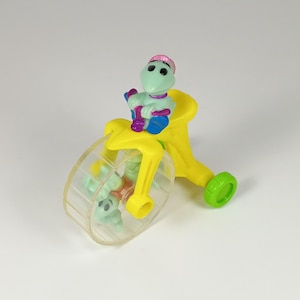 May include: A set of three ceramic mugs with a speckled, matte finish. Each mug features a different color: light blue, cream, and gray. The mugs have a simple, modern design and a comfortable handle.