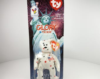 Peluche vintage de los 90 de Glory The Bear, de la marca TY Teenie Babies, de McDonald's (embalaje abollado y rayado).