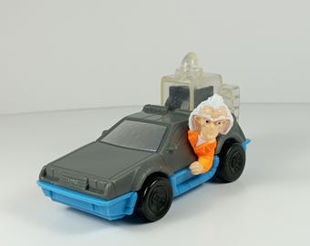 Coche de juguete "Spark Car" de Regreso al Futuro con Doc Brown, modelo de 1991 *Funciona*