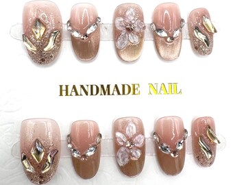 Uñas postizas - Hechas a mano / Talla S / Ovaladas cortas / Diamantes de imitación / Ojo de gato / Flor 3D / Brillantina / Doradas