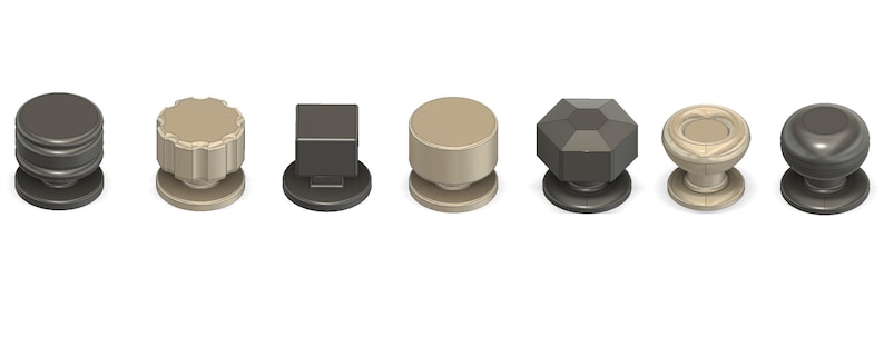 May include: A selection of seven cabinet knobs in different styles and colours. The knobs feature designs such as a stacked cylinder, fluted, square, smooth cylinder, faceted, heart-shaped, and rounded. Each knob has a base, suitable for furniture.