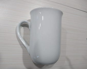 4 1/4" TALL.3" ACROSS TOP 4" wide including handle