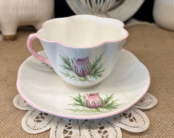 Tazza da tè e piattino vintage Shelley England Thistle 13820 in fine porcellana con bordo rosa.