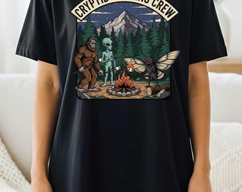 Cryptid Camping Crew T-Shirt – Funny Bigfoot Alien Mothman Campfire Graphic Tee for Cryptid Lovers, Outdoor Adventure & Camping Fans