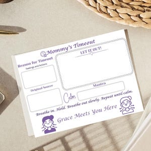 May include: A white card with purple text and illustrations, titled "Mommy's Timeout." It includes sections for "Reason for Timeout," "Original Source," and "Mantra." The card also features the phrases "Let It Out!" and "Grace Meets You Here."