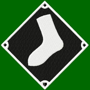 May include: A black and white baseball diamond with a white sock in the centre.