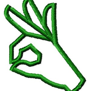 May include: A green outline of a hand making the OK sign.